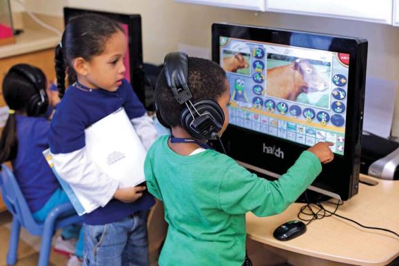 Two children on a computer