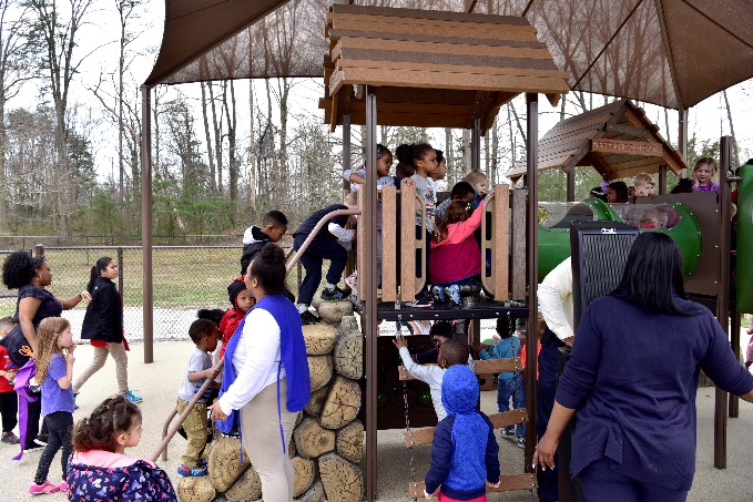 Shade over climbing structures helps protect children from the sun and the heat when the temperature is high.