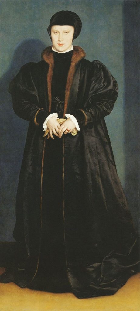 Woman standing in modest clothing