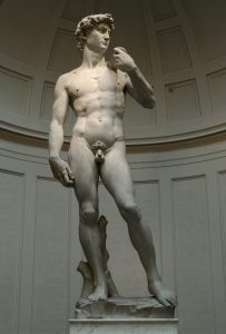 marble statue of nude male in contrapuntal stance